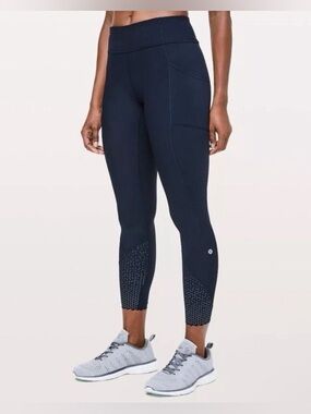 Lululemon Navy blue leggings with reflective polka dots on lower legs size 8 🫧